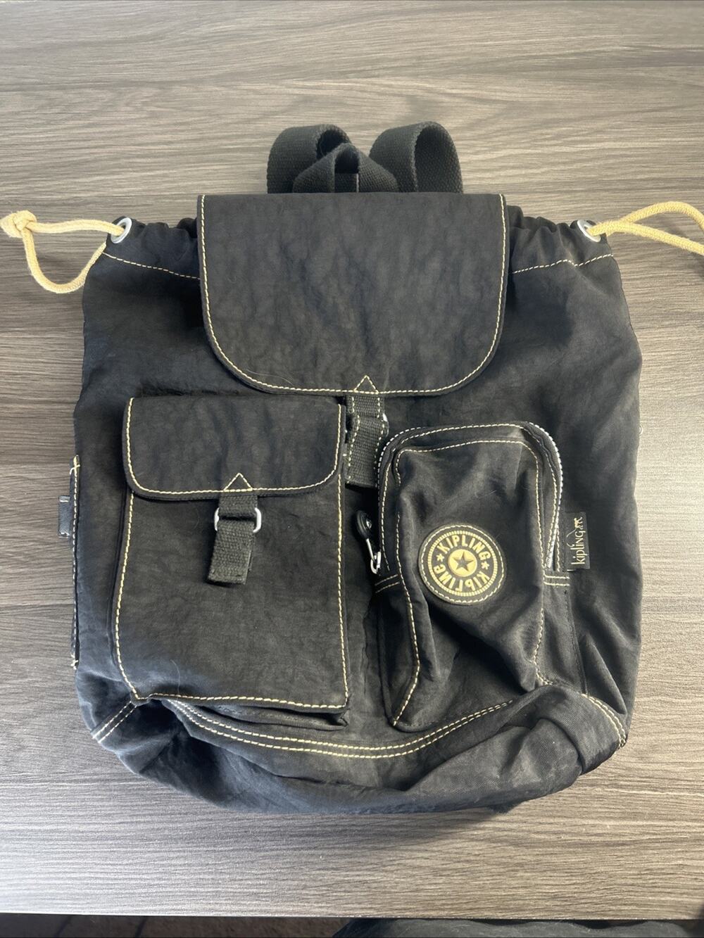 Kipling Black Tan Drawstring Backpack Nylon Multi Pocket 11” x 11” Purse Bag